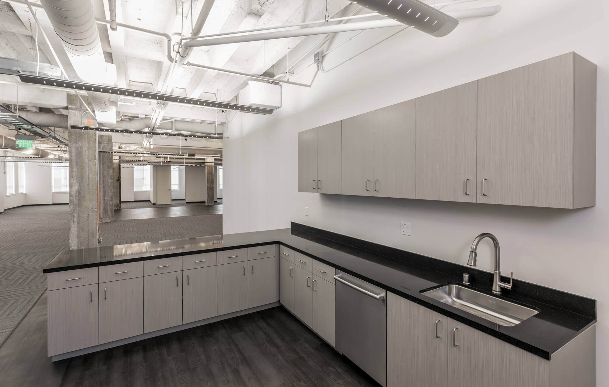 a large room with modular kitchen