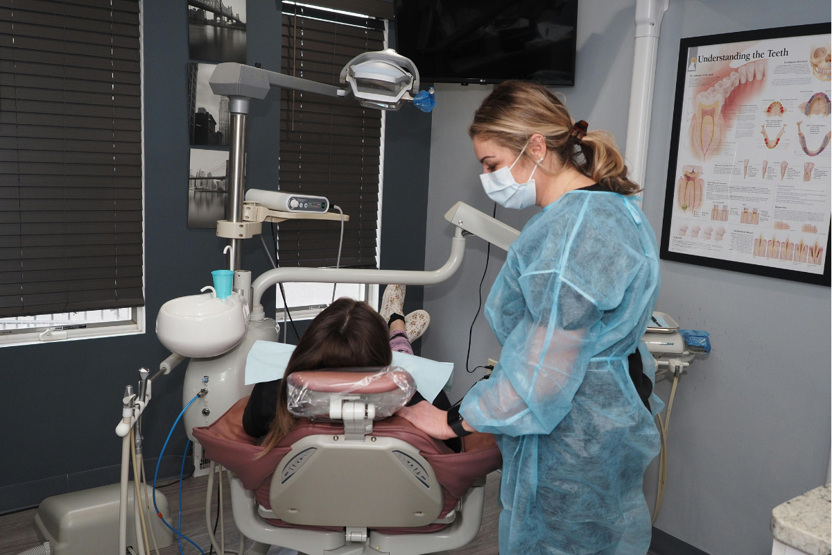 a dentist operating on a patient