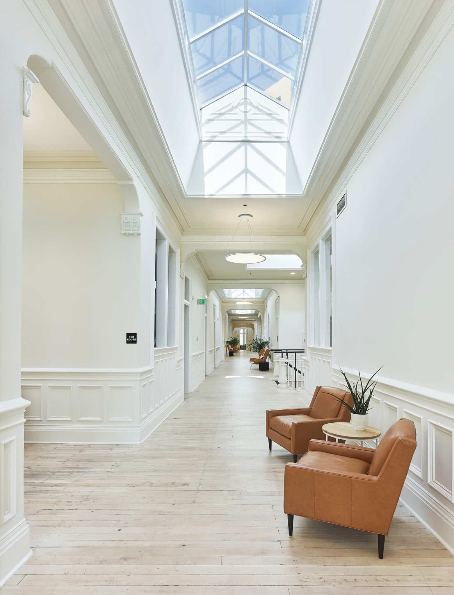 2 brown chairs in office of ThredUp- San Francisco