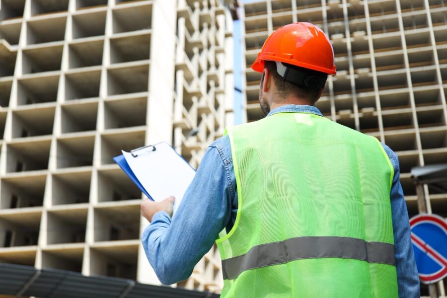building code inspector at construction site