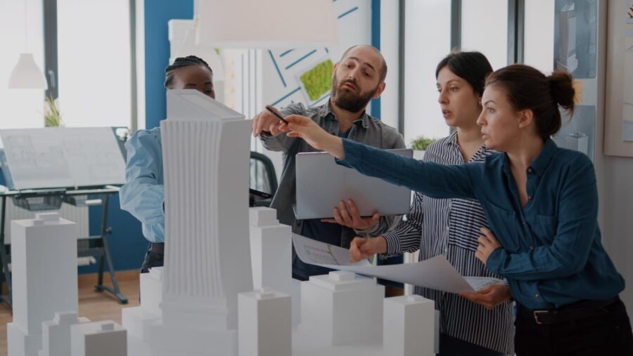 architects and contractors working on building information modeling