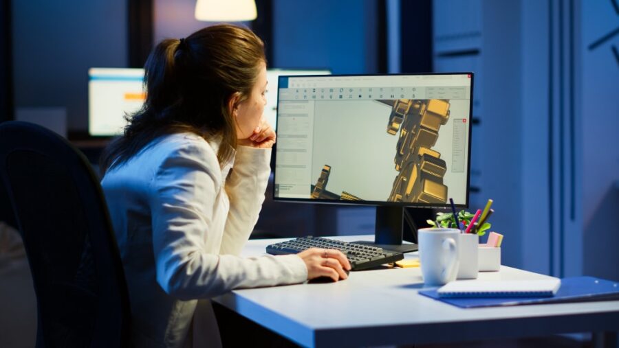 a woman architect working on building information modeling bim software