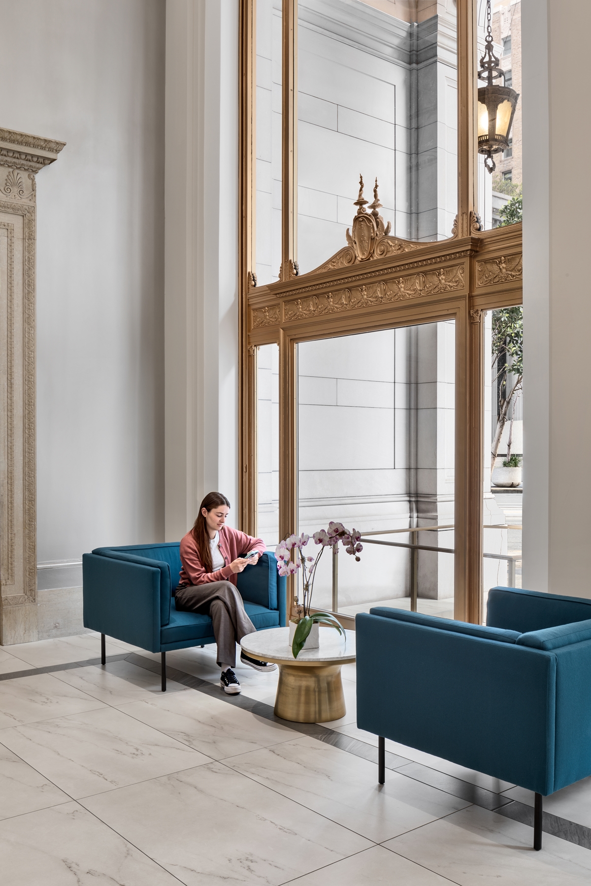 lobby interiors with two blue sofas