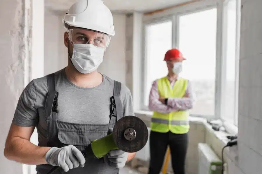 two subcontractors at a construction site