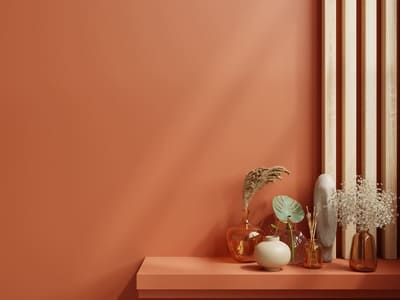 Shelf mockup in a modern empty room, dark orange wall. 3d rendering.