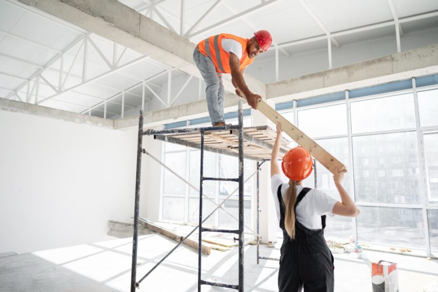 two construction workers at a site