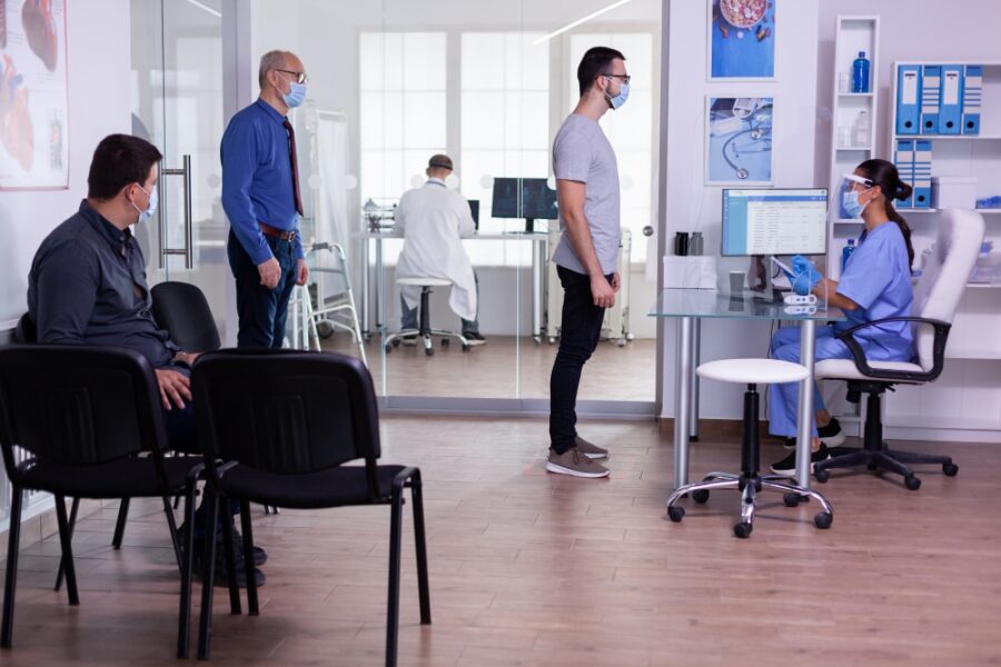 patients and nurses in a medical office 