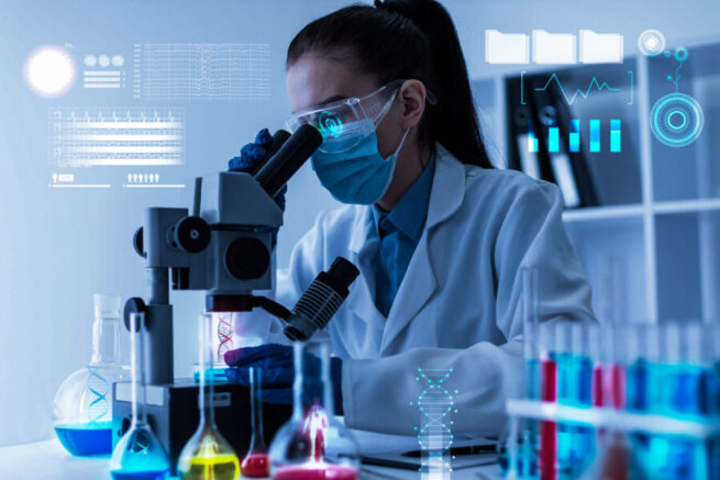 a scientist at a life sciences lab conducting microscope research