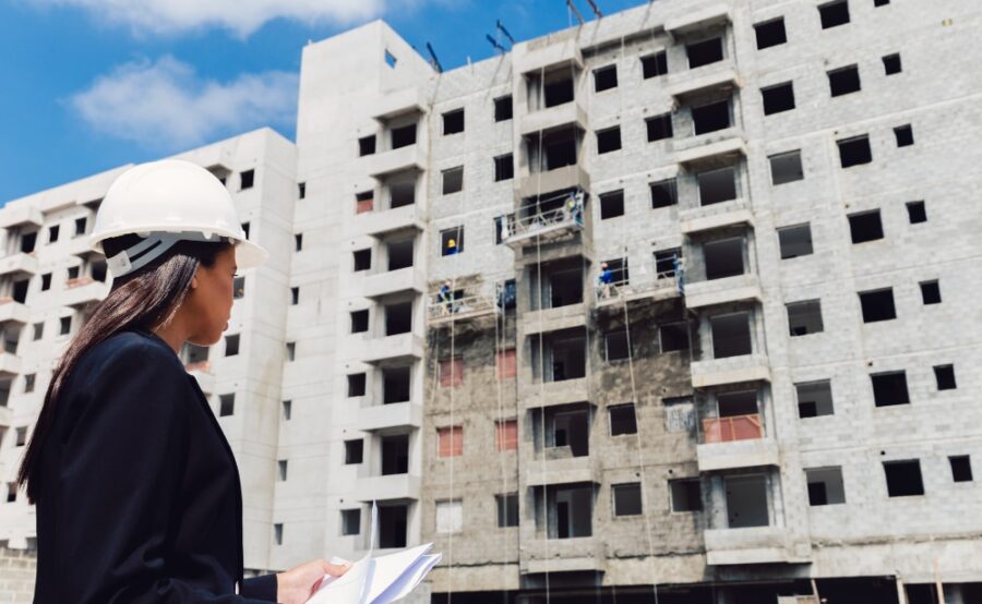 a female construction manager overseeing seismic retrofitting project