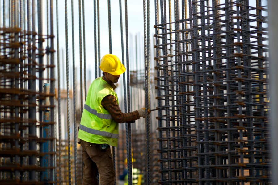 Construction Workers working on structural steel.